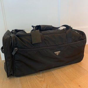 Prada Nylon and Saffiano Travel luggage with wheels